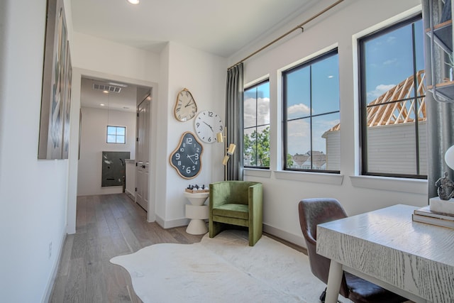 1720 Sedola Ln, Houston, TX 77055 - office with baseboards and wood finished floors