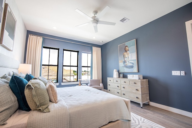 1720 Sedola Ln, Houston, TX 77055 - bedroom featuring wood finished floors, a ceiling fan, and recessed lighting