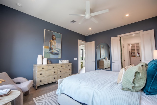 1720 Sedola Ln, Houston, TX 77055 - bedroom with wood finished floors, recessed lighting, and ceiling fan