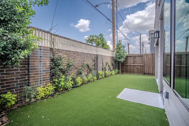 1720 Sedola Ln, Houston, TX 77055 - fenced backyard with a patio