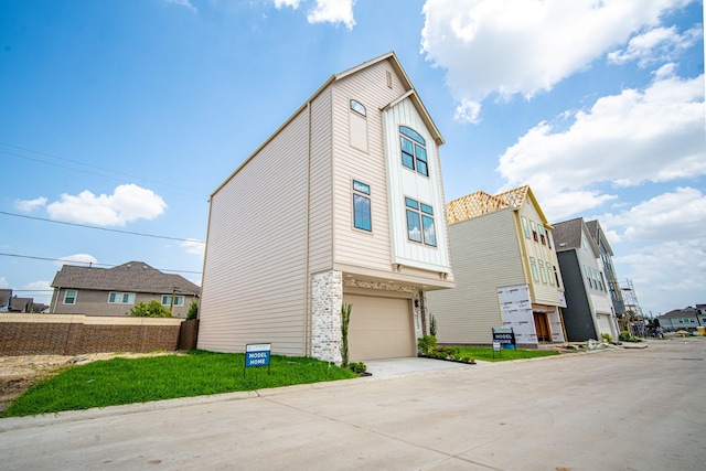1720 Sedola Ln, Houston, TX 77055 - view of front of house with an attached garage and concrete driveway