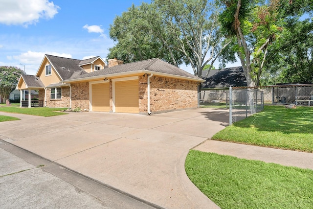 2101 Rocky Creek Ln, Pearland, TX 77581 - view of front of home featuring brick siding, an attached garage, concrete driveway, and a shingled roof
