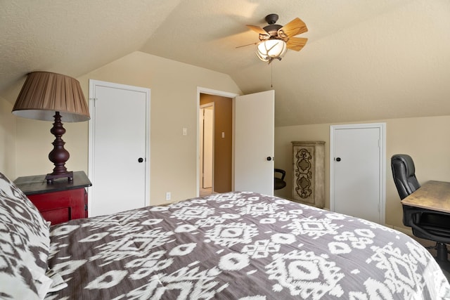 2101 Rocky Creek Ln, Pearland, TX 77581 - bedroom featuring lofted ceiling, ceiling fan, and a textured ceiling
