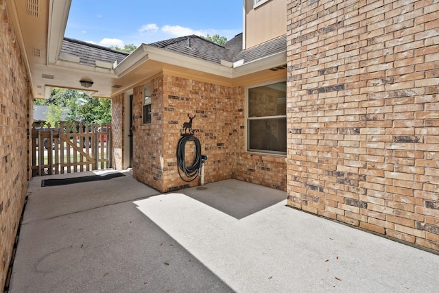 2101 Rocky Creek Ln, Pearland, TX 77581 - view of patio featuring a gate