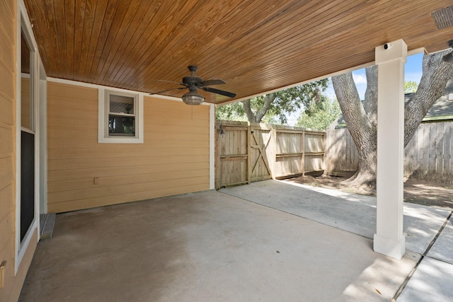 2101 Rocky Creek Ln, Pearland, TX 77581 - view of patio featuring ceiling fan and a gate