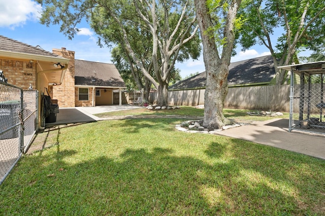 2101 Rocky Creek Ln, Pearland, TX 77581 - fenced backyard with a patio area