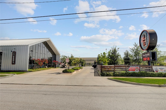 2232 Leeland St, Houston, TX 77003 - view of asphalt street with curbs and a gated entry