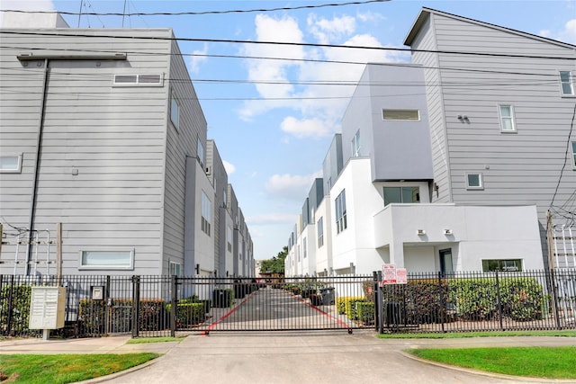 2232 Leeland St, Houston, TX 77003 - view of concrete street with a gated entry and a gate