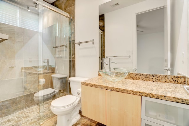 2232 Leeland St, Houston, TX 77003 - bathroom featuring vanity and a shower stall