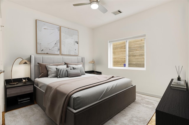 2232 Leeland St, Houston, TX 77003 - bedroom with a ceiling fan and light wood-style flooring