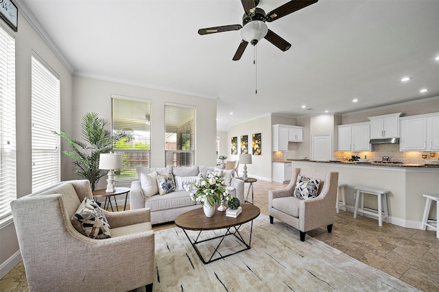 27910 Wedgeoak Ct, Katy, TX 77494 - living room with ornamental molding, a ceiling fan, and recessed lighting