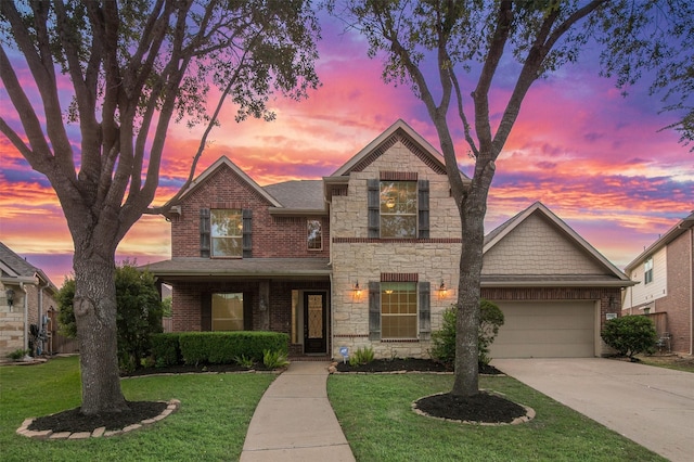 27910 Wedgeoak Ct, Katy, TX 77494 - traditional home with a front yard, driveway, and stone siding
