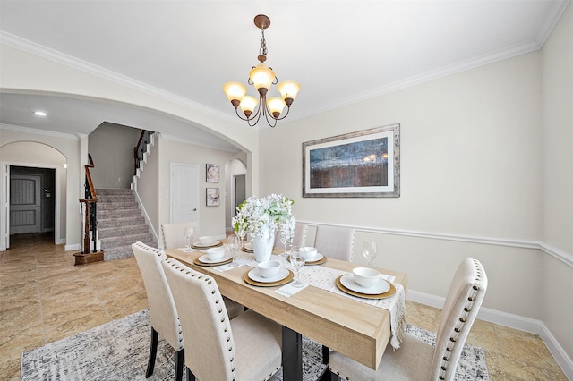 27910 Wedgeoak Ct, Katy, TX 77494 - dining area featuring arched walkways, stairway, a chandelier, crown molding, and light stone finish floors