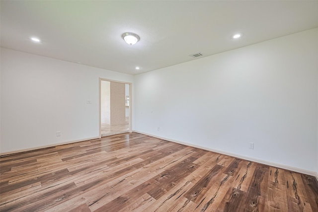 982 W Donovan St, Houston, TX 77091 - spare room with light wood-style flooring and recessed lighting