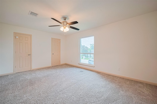 982 W Donovan St, Houston, TX 77091 - unfurnished room featuring light carpet and a ceiling fan