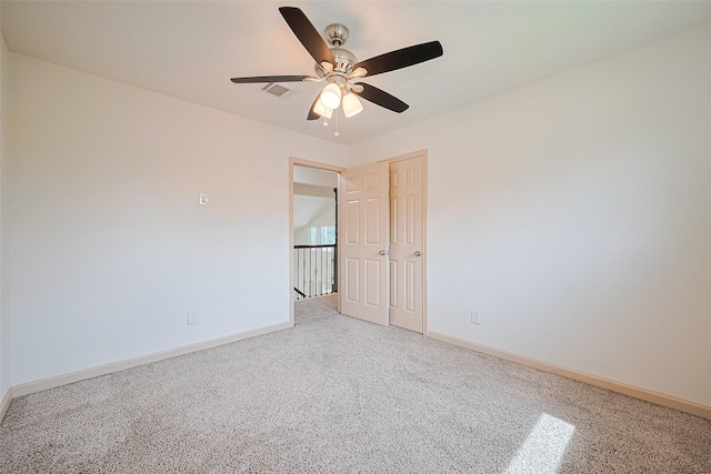 982 W Donovan St, Houston, TX 77091 - spare room with light colored carpet and a ceiling fan
