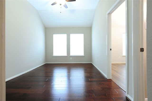 8022 Thorncroft Manor Ln, Richmond, TX 77407 - unfurnished room with vaulted ceiling, ceiling fan, and dark wood finished floors