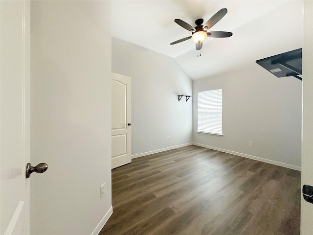8022 Thorncroft Manor Ln, Richmond, TX 77407 - spare room featuring ceiling fan, vaulted ceiling, and dark wood finished floors