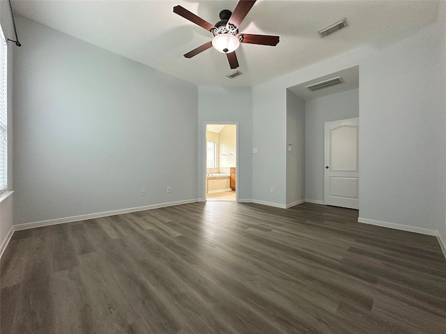 8022 Thorncroft Manor Ln, Richmond, TX 77407 - spare room featuring ceiling fan and dark wood-style floors