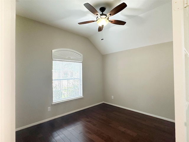 8022 Thorncroft Manor Ln, Richmond, TX 77407 - spare room with a ceiling fan, dark wood-style flooring, and vaulted ceiling