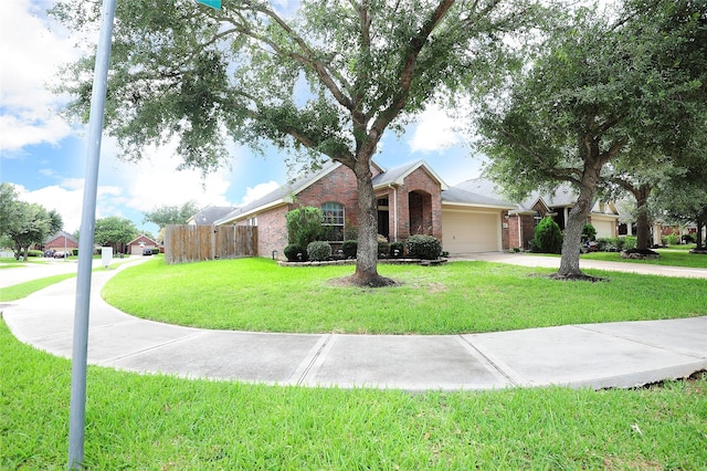 8022 Thorncroft Manor Ln, Richmond, TX 77407 - ranch-style home featuring an attached garage, brick siding, and driveway