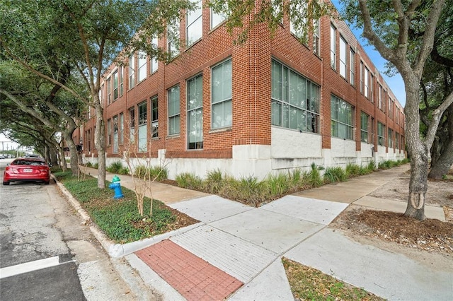 1312 Live Oak St Unit 215, Houston, TX 77003 - view of property exterior with brick siding