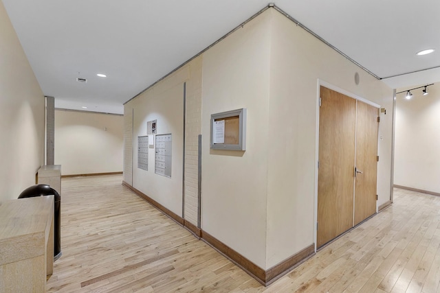 1312 Live Oak St Unit 215, Houston, TX 77003 - hall with light wood-type flooring and recessed lighting