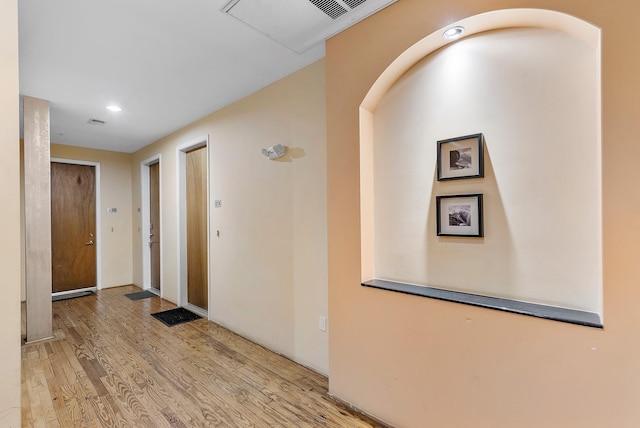 1312 Live Oak St Unit 215, Houston, TX 77003 - corridor featuring wood finished floors and recessed lighting