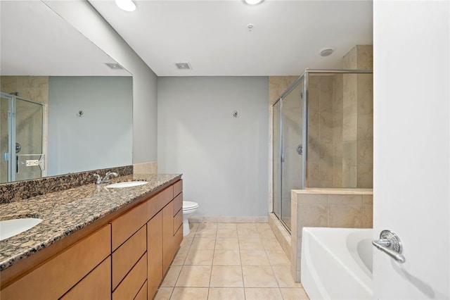 1312 Live Oak St Unit 215, Houston, TX 77003 - full bath with a shower stall, a bath, double vanity, and tile patterned floors