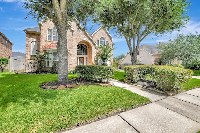 15510 Marble Canyon Way, Houston, TX 77044 - traditional-style house with brick siding