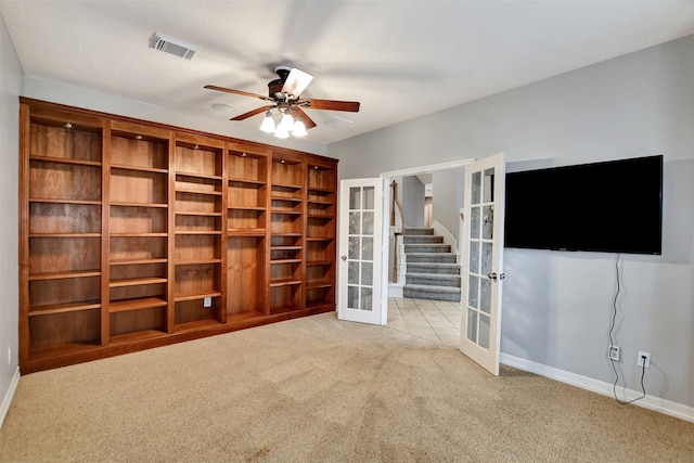 15510 Marble Canyon Way, Houston, TX 77044 - carpeted empty room featuring french doors and ceiling fan