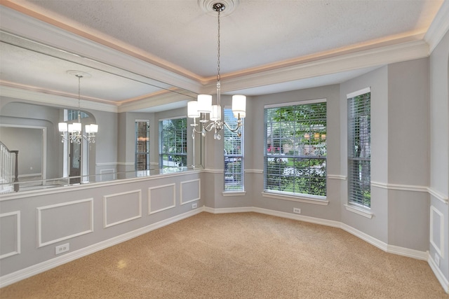 15510 Marble Canyon Way, Houston, TX 77044 - unfurnished dining area featuring a chandelier, carpet flooring, a raised ceiling, and crown molding