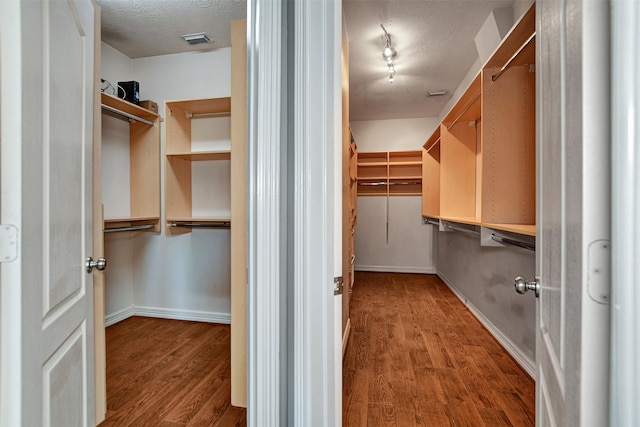 15510 Marble Canyon Way, Houston, TX 77044 - spacious closet with wood finished floors