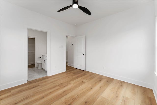 3327 Cornell St Unit A B, Houston, TX 77022 - unfurnished bedroom featuring light wood finished floors, connected bathroom, and ceiling fan