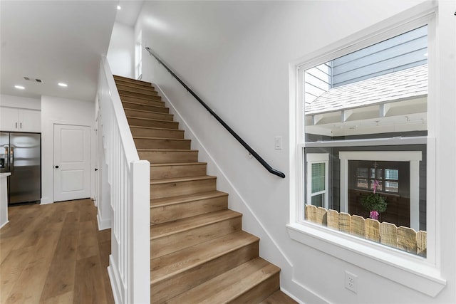 3327 Cornell St Unit A B, Houston, TX 77022 - stairs with wood finished floors and recessed lighting