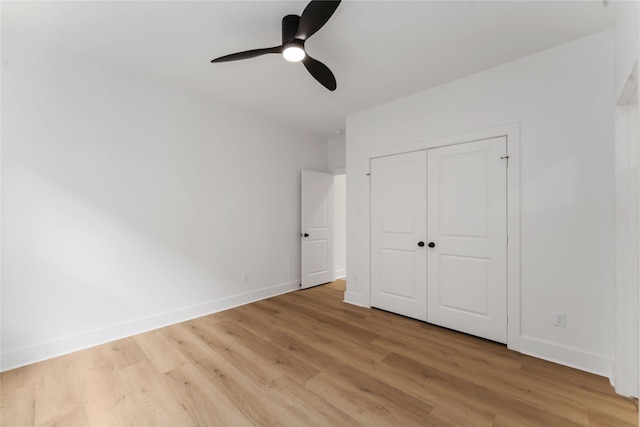 3327 Cornell St Unit A B, Houston, TX 77022 - unfurnished bedroom featuring light wood-style floors, a closet, and a ceiling fan