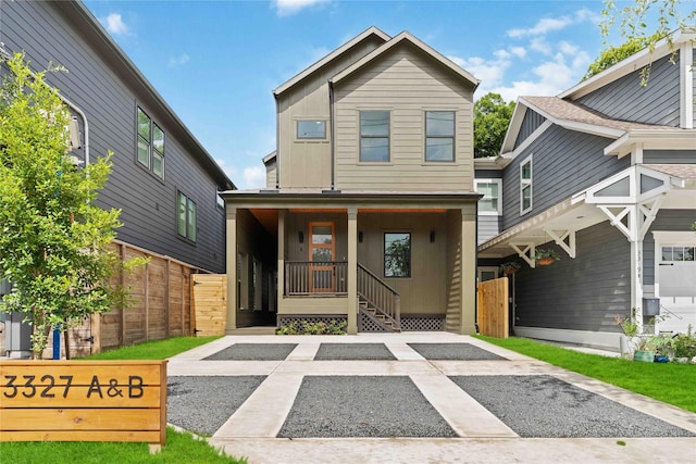 3327 Cornell St Unit A B, Houston, TX 77022 - contemporary house featuring covered porch and board and batten siding