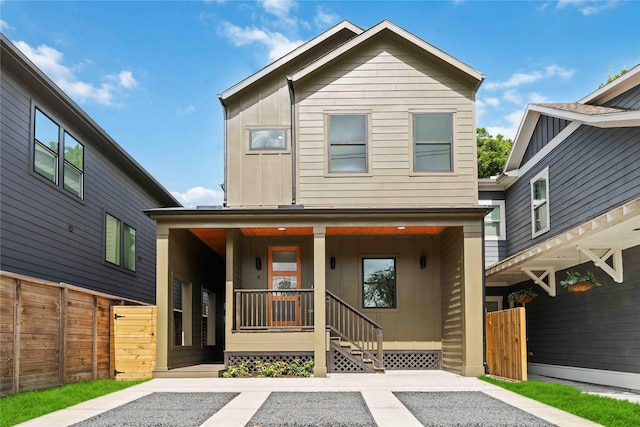3327 Cornell St Unit A B, Houston, TX 77022 - view of front facade with a porch and board and batten siding