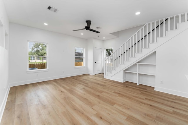 3327 Cornell St Unit A B, Houston, TX 77022 - unfurnished living room featuring stairs, wood finished floors, a ceiling fan, and recessed lighting