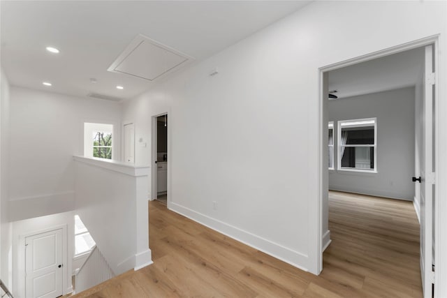 3327 Cornell St Unit A B, Houston, TX 77022 - hall featuring an upstairs landing, attic access, light wood-style flooring, and recessed lighting