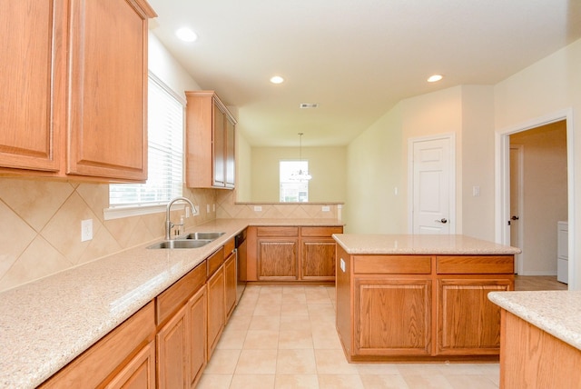 18702 Cypress Loch Dr, Spring, TX 77379 - kitchen featuring plenty of natural light, decorative backsplash, stainless steel dishwasher, recessed lighting, and a kitchen island