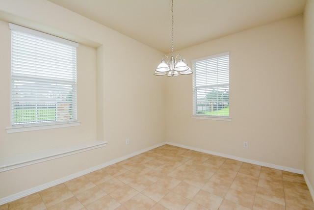 18702 Cypress Loch Dr, Spring, TX 77379 - empty room with a chandelier, plenty of natural light, and light tile patterned floors