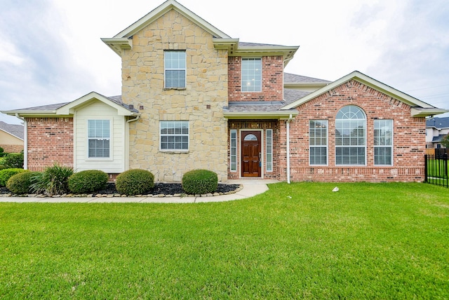 18702 Cypress Loch Dr, Spring, TX 77379 - traditional-style home with stone siding, roof with shingles, and brick siding