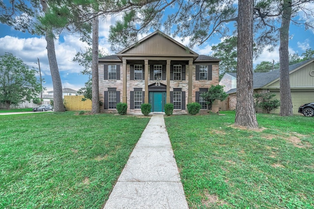 17203 Kettle Creek Dr, Spring, TX 77379 - neoclassical home featuring brick siding