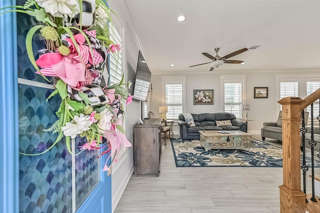 6 Caravelle Ct, Galveston, TX 77554 - living room with a ceiling fan, healthy amount of natural light, recessed lighting, wood finished floors, and ornamental molding