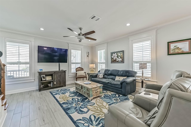 6 Caravelle Ct, Galveston, TX 77554 - living area with a ceiling fan, wood finished floors, recessed lighting, and crown molding