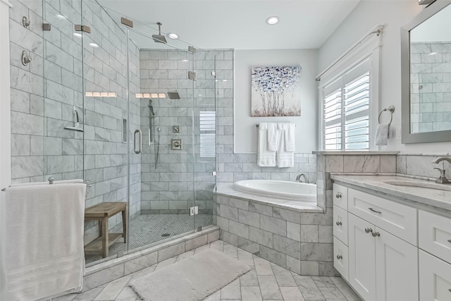6 Caravelle Ct, Galveston, TX 77554 - bathroom with a bath, vanity, a shower stall, recessed lighting, and marble finish floors
