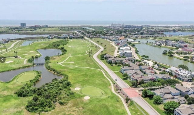 6 Caravelle Ct, Galveston, TX 77554 - aerial perspective of suburban area featuring a nearby body of water and a local golf course