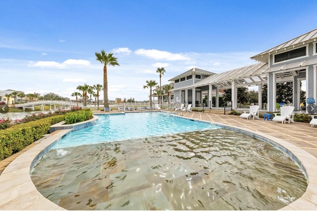 6 Caravelle Ct, Galveston, TX 77554 - community pool featuring a patio area