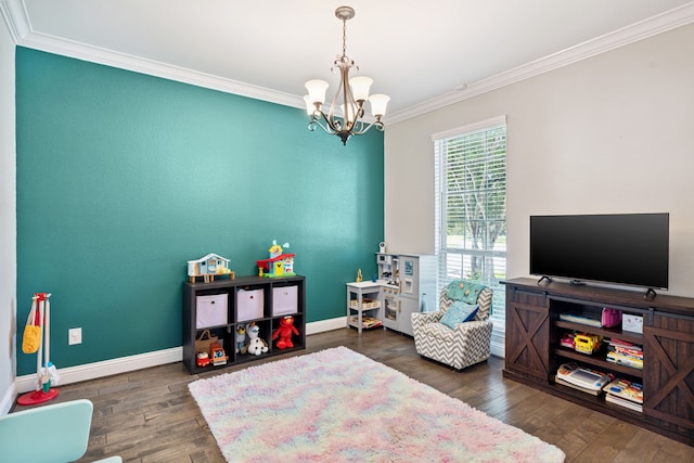 20102 Three Chutes Ln, Cypress, TX 77433 - playroom with ornamental molding, a chandelier, and wood finished floors